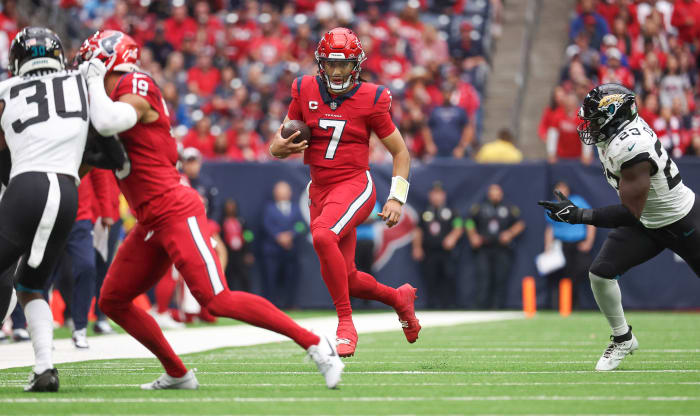 Nov 26, 2023; Houston, Texas, USA; Houston Texans quarterback C.J. Stroud (7) runs with the ball during the second quarter against the Jacksonville Jaguars at NRG Stadium. Mandatory Credit: Troy Taormina-USA TODAY Sports